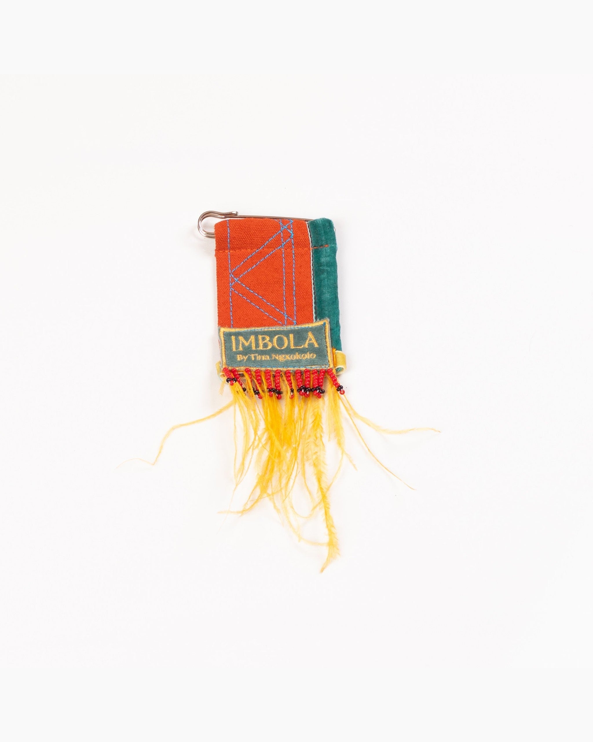 Imbola Orange Feather Pin